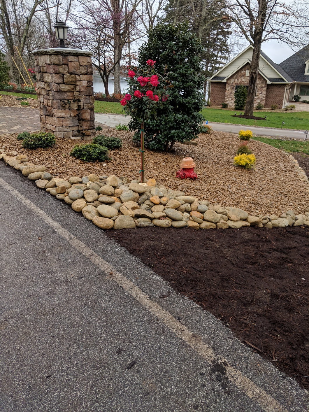 waterfeature retainer wall patio outdoor kitchen New construction Low Voltage Lighting Landscaping Landscapes Irrigation Hardscaping Glade fireplace firepit faux rock Fairfield curb Cumberland county Crossville Landscaping Crossville concrete